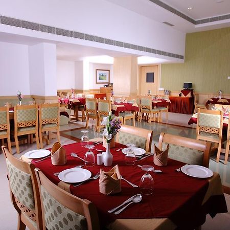 Pooram International Hotel Thrissur Exterior photo